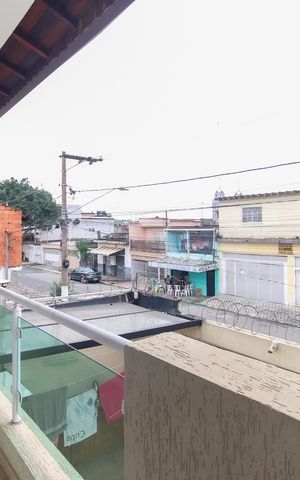Casa à venda com 70m², 2 quartos e 2 vagas Casa à venda com 70m², 2 quartos e 2 vagasVaranda do Quarto 1