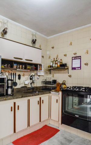 Casa à venda com 125m², 3 quartos e 2 vagas Casa à venda com 125m², 3 quartos e 2 vagasCozinha