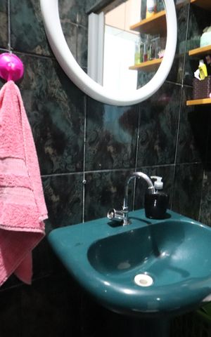 Casa à venda com 200m², 1 quarto e 2 vagasBanheiro de Baixo