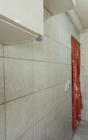 Apartamento à venda com 48m², 3 quartos e 1 vaga Apartamento à venda com 48m², 3 quartos e 1 vagaCozinha e Área de Serviço
