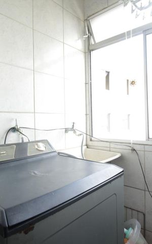 Apartamento à venda com 48m², 3 quartos e 1 vaga Apartamento à venda com 48m², 3 quartos e 1 vagaCozinha e Área de Serviço
