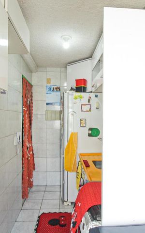 Apartamento à venda com 48m², 3 quartos e 1 vaga Apartamento à venda com 48m², 3 quartos e 1 vagaCozinha e Área de Serviço