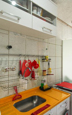 Apartamento à venda com 48m², 3 quartos e 1 vaga Apartamento à venda com 48m², 3 quartos e 1 vagaCozinha e Área de Serviço
