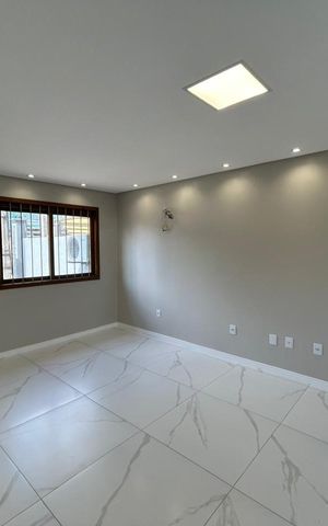 Casa à venda com 100m², 3 quartos e 2 vagas Casa à venda com 100m², 3 quartos e 2 vagasSala
