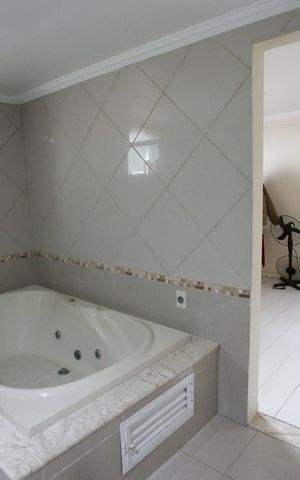 Casa à venda com 440m², 6 quartos e 1 vagaBanheiro da Suíte 1