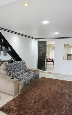 Casa à venda com 440m², 6 quartos e 1 vagaSala de TV