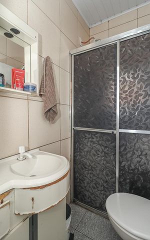 Casa à venda com 126m², 3 quartos e 1 vagaBanheiro