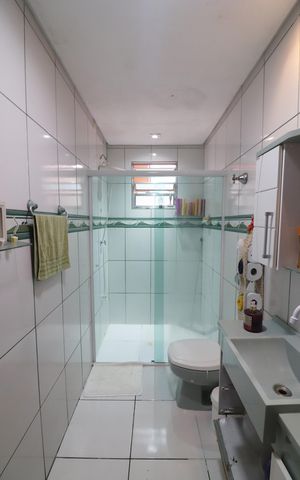 Casa à venda com 180m², 2 quartos e 2 vagasQuarto 3 - Suíte Banheiro 