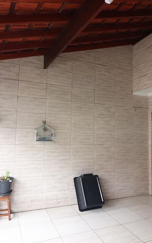 Casa à venda com 180m², 2 quartos e 2 vagasQuarto 3 - Suíte Varanda 