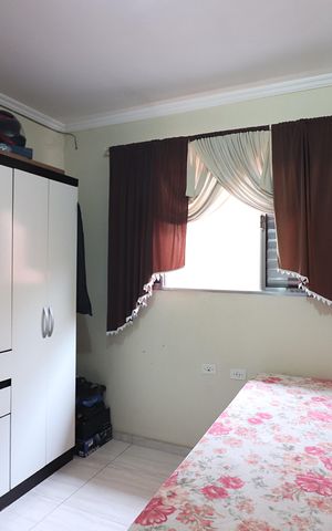 Casa à venda com 180m², 2 quartos e 2 vagasQuarto 1 - Suíte