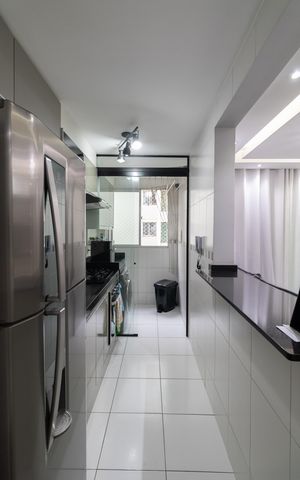 Apartamento à venda com 47m², 2 quartos e 1 vaga Apartamento à venda com 47m², 2 quartos e 1 vagaCozinha e Área de Serviço