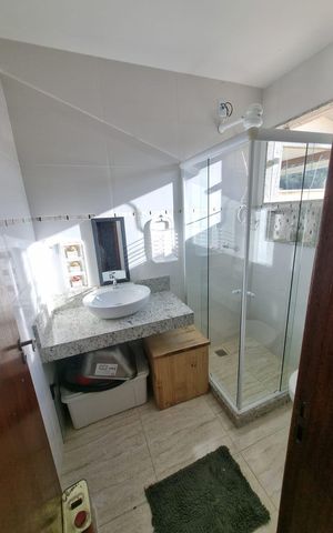 Casa à venda com 130m², 3 quartos e 2 vagas Casa à venda com 130m², 3 quartos e 2 vagasBanheiro