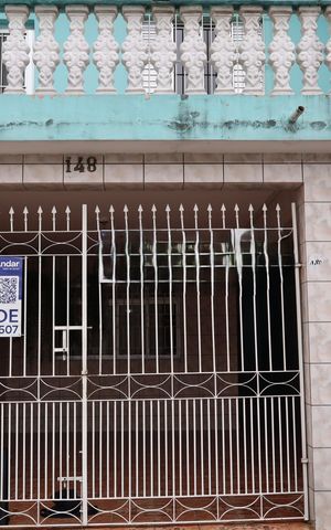 Casa à venda com 125m², 4 quartos e 2 vagasFachada e portão