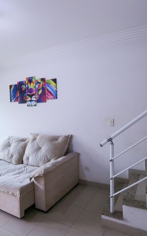 Casa à venda com 130m², 2 quartos e 2 vagas Casa à venda com 130m², 2 quartos e 2 vagasSala