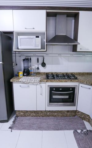 Casa à venda com 130m², 2 quartos e 2 vagas Casa à venda com 130m², 2 quartos e 2 vagasCozinha