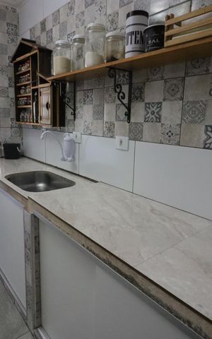 Apartamento à venda com 62m², 2 quartos e 1 vagaCozinha e Área de Serviço