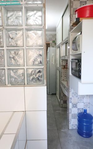 Apartamento à venda com 62m², 2 quartos e 1 vagaCozinha e Área de Serviço