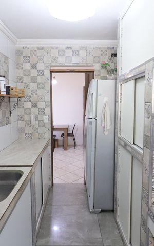 Apartamento à venda com 62m², 2 quartos e 1 vagaCozinha e Área de Serviço