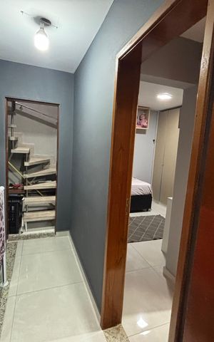 Casa à venda com 210m², 3 quartos e 2 vagas Casa à venda com 210m², 3 quartos e 2 vagasCorredor