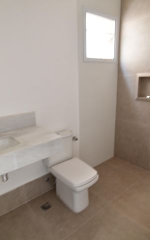 Casa de condomínio à venda com 245m², 3 quartos e 2 vagasBanheiro Suíte