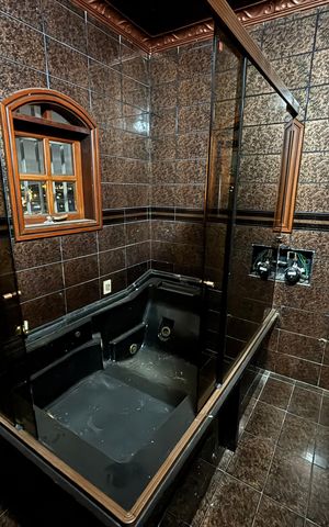 Casa à venda com 369m², 3 quartos e 2 vagasBanheiro da Suíte 1