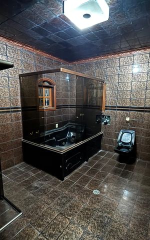 Casa à venda com 369m², 3 quartos e 2 vagasBanheiro da Suíte 1