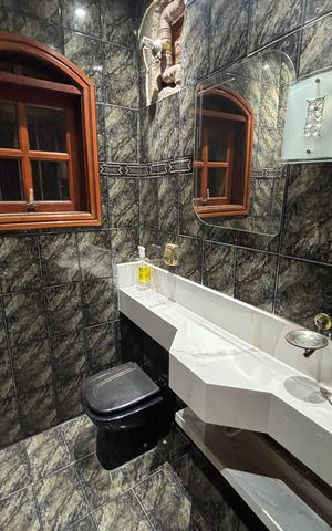 Casa à venda com 369m², 3 quartos e 2 vagasBanheiro da Suíte 1