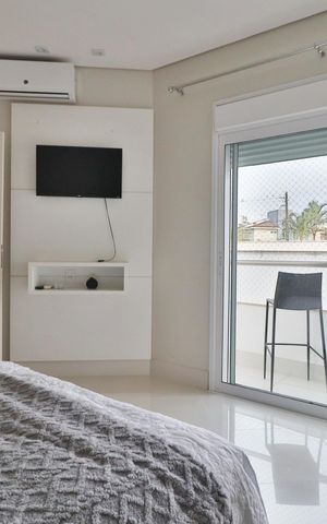Casa de condomínio para alugar com 319m², 3 quartos e 4 vagasQuarto 2 - Suíte