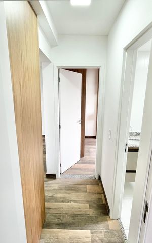 Apartamento à venda com 55m², 2 quartos e 1 vaga Apartamento à venda com 55m², 2 quartos e 1 vagaCorredor