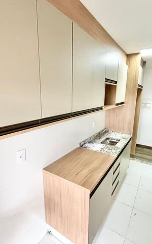 Apartamento à venda com 55m², 2 quartos e 1 vaga Apartamento à venda com 55m², 2 quartos e 1 vagaCozinha e Área de Serviço