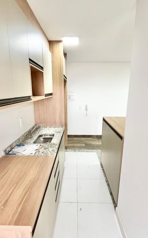 Apartamento à venda com 55m², 2 quartos e 1 vaga Apartamento à venda com 55m², 2 quartos e 1 vagaCozinha e Área de Serviço