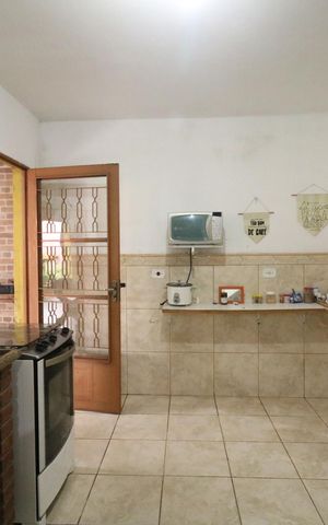 Casa à venda com 246m², 2 quartos e 2 vagas Casa à venda com 246m², 2 quartos e 2 vagasCozinha