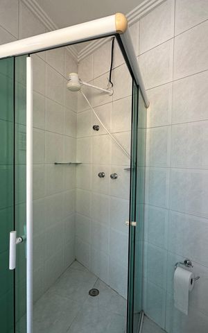 Casa de condomínio para alugar com 254m², 4 quartos e 11 vagas Casa de condomínio para alugar com 254m², 4 quartos e 11 vagasBanheiro da Suíte 1