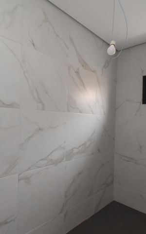 Casa de condomínio à venda com 211m², 3 quartos e 4 vagasBanheiro 2