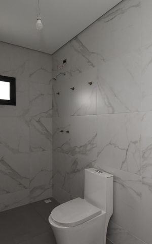 Casa de condomínio à venda com 211m², 3 quartos e 4 vagasBanheiro da Suíte