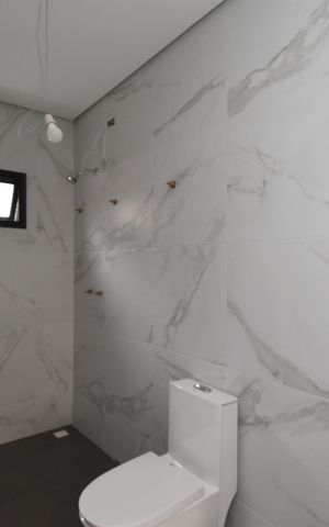 Casa de condomínio à venda com 211m², 3 quartos e 4 vagasBanheiro 2