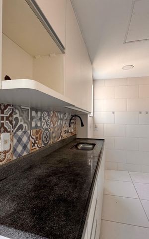 Casa de condomínio para alugar com 100m², 2 quartos e 2 vagasCozinha e Área de Serviço