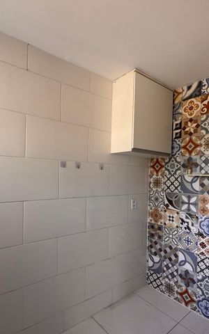 Casa de condomínio para alugar com 100m², 2 quartos e 2 vagasCozinha e Área de Serviço