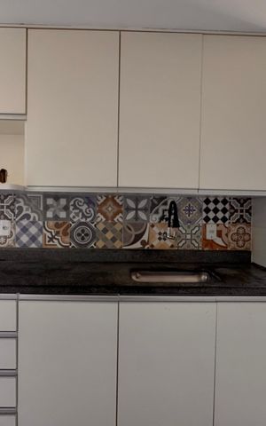 Casa de condomínio para alugar com 100m², 2 quartos e 2 vagasCozinha e Área de Serviço