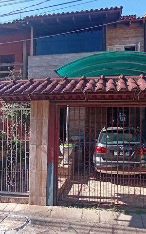 Casa de condomínio à venda com 100m², 3 quartos e 1 vaga Casa de condomínio à venda com 100m², 3 quartos e 1 vagaFachada