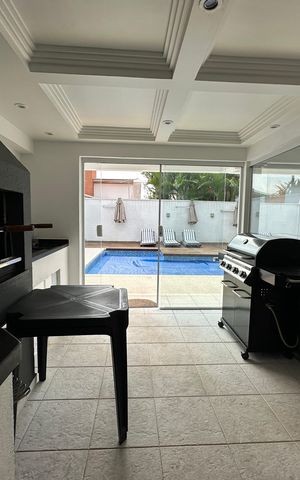 Casa de condomínio para alugar com 348m², 4 quartos e 6 vagas Casa de condomínio para alugar com 348m², 4 quartos e 6 vagasChurrasqueira