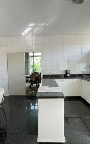 Casa à venda com 390m², 4 quartos e 4 vagas Casa à venda com 390m², 4 quartos e 4 vagasCozinha