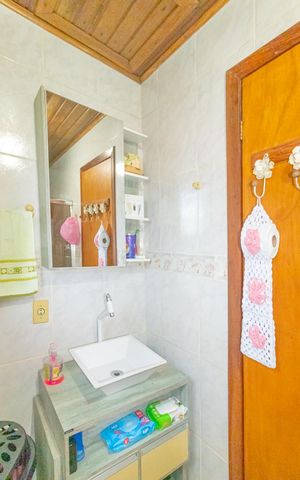 Casa à venda com 86m², 3 quartos e 2 vagas Casa à venda com 86m², 3 quartos e 2 vagasBanheiro da Suíte