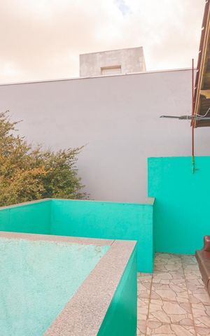 Casa à venda com 86m², 3 quartos e 2 vagas Casa à venda com 86m², 3 quartos e 2 vagasVaranda/Fundos