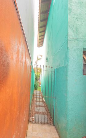 Casa à venda com 86m², 3 quartos e 2 vagas Casa à venda com 86m², 3 quartos e 2 vagasFachada Lateral
