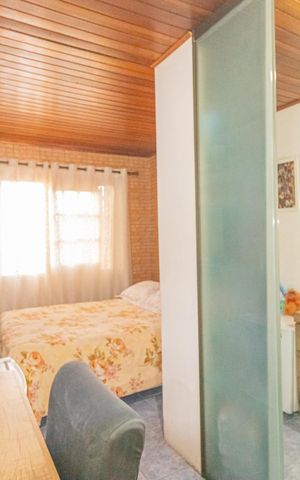 Casa à venda com 86m², 3 quartos e 2 vagas Casa à venda com 86m², 3 quartos e 2 vagasQuarto 2 - Suíte