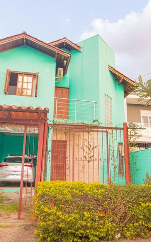 Casa à venda com 86m², 3 quartos e 2 vagas Casa à venda com 86m², 3 quartos e 2 vagasFachada