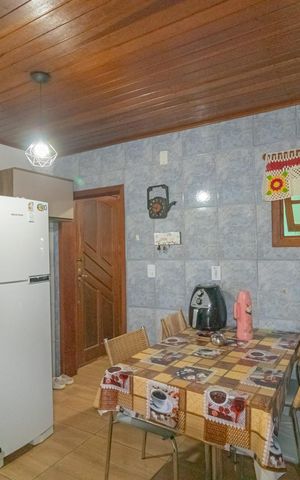 Casa à venda com 86m², 3 quartos e 2 vagas Casa à venda com 86m², 3 quartos e 2 vagasCozinha