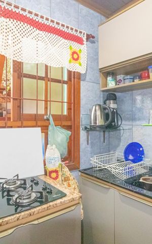 Casa à venda com 86m², 3 quartos e 2 vagas Casa à venda com 86m², 3 quartos e 2 vagasCozinha