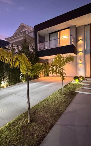 Casa de condomínio à venda com 450m², 4 quartos e 3 vagas Casa de condomínio à venda com 450m², 4 quartos e 3 vagasFachada
